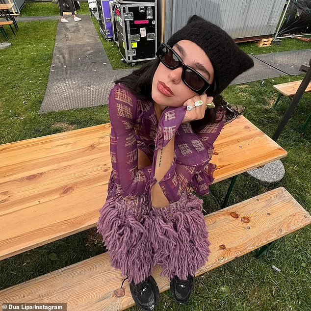 Dua Lipa stuns in a boho-chic dress with a plunging neckline during her ...